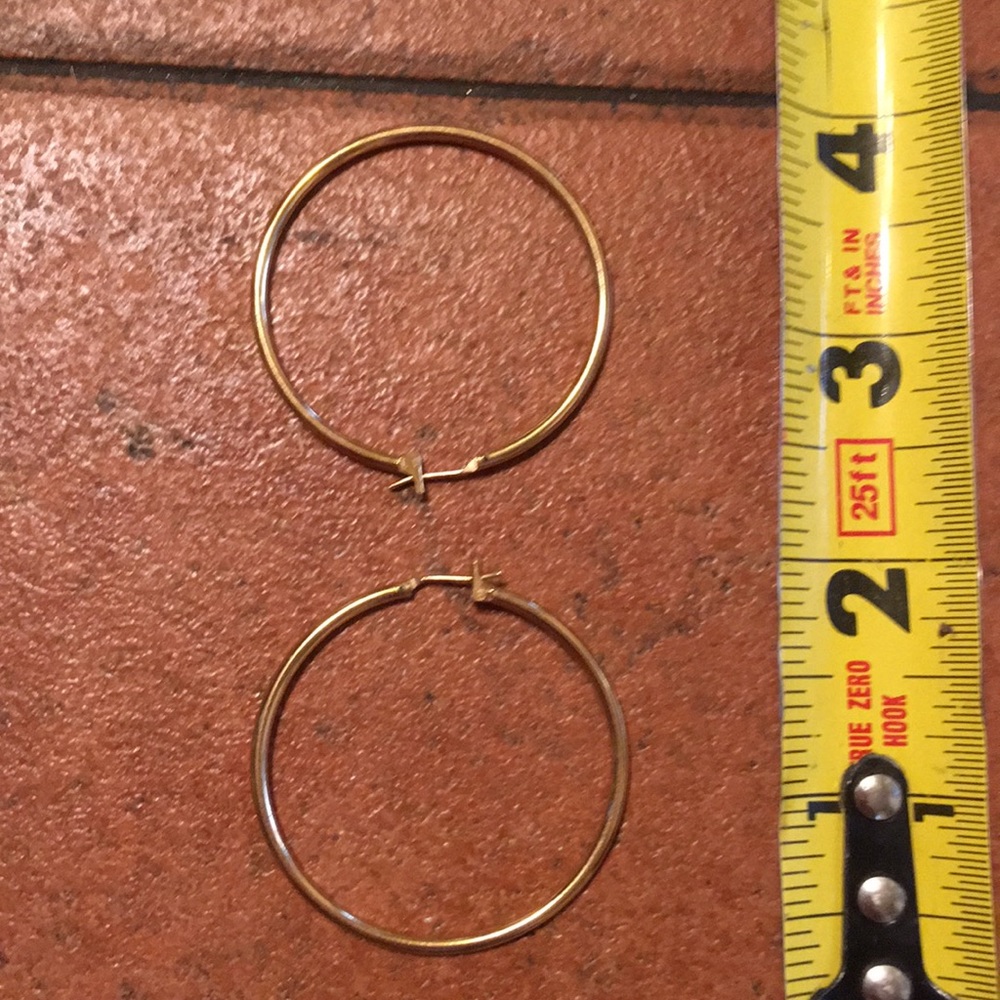 Gold pierced hoop earrings
